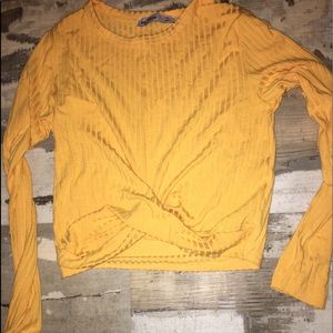 Yellow cropped shirt